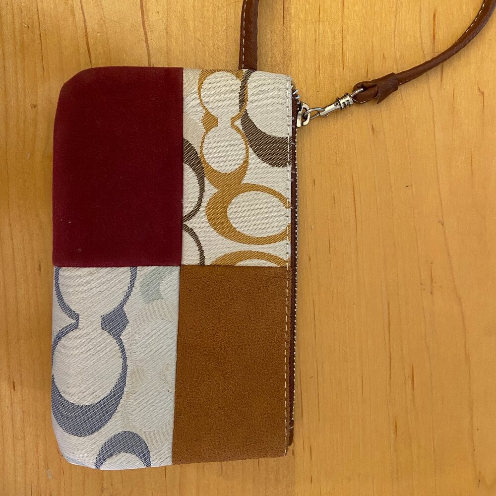 Like new Coach patchwork wristlet